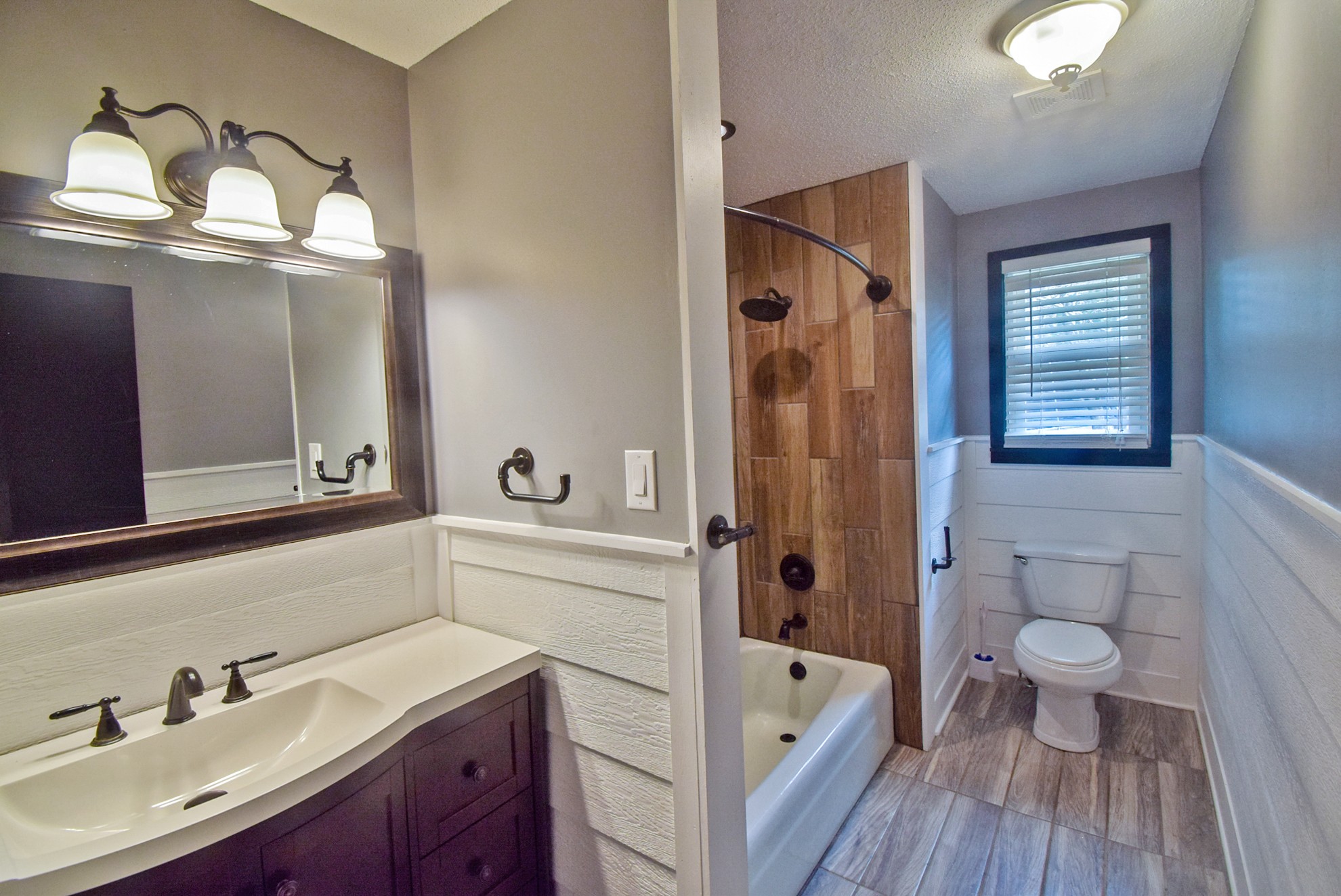 710 Dean Road Clarksville, TN 37040 - Photo 10 of 17 a bathroom with a sink a toilet and shower