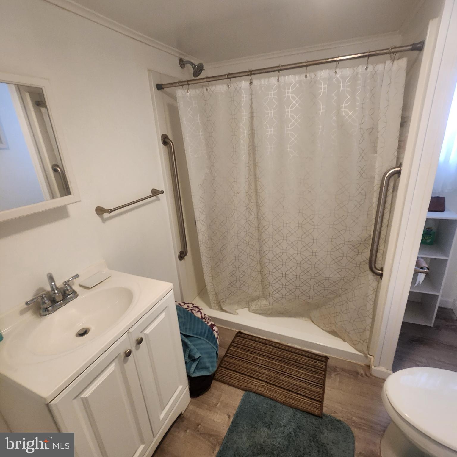 749 Clouser Hollow Road New Bloomfield, PA 17068 - Photo 11 of 30 a bathroom with a sink and a mirror
