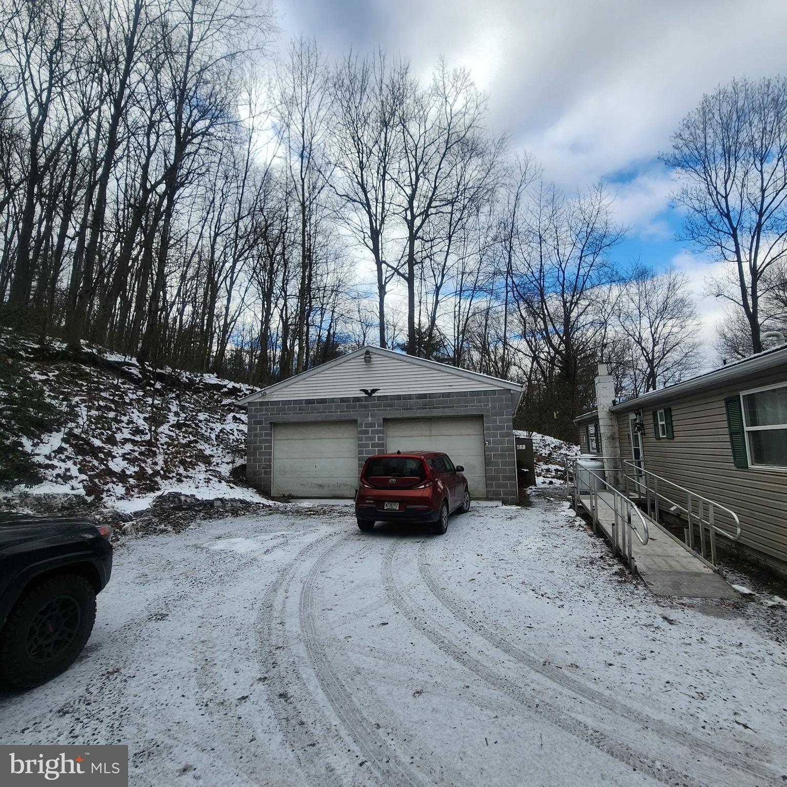 749 Clouser Hollow Road New Bloomfield, PA 17068 - Photo 26 of 30 a car parked in front of house