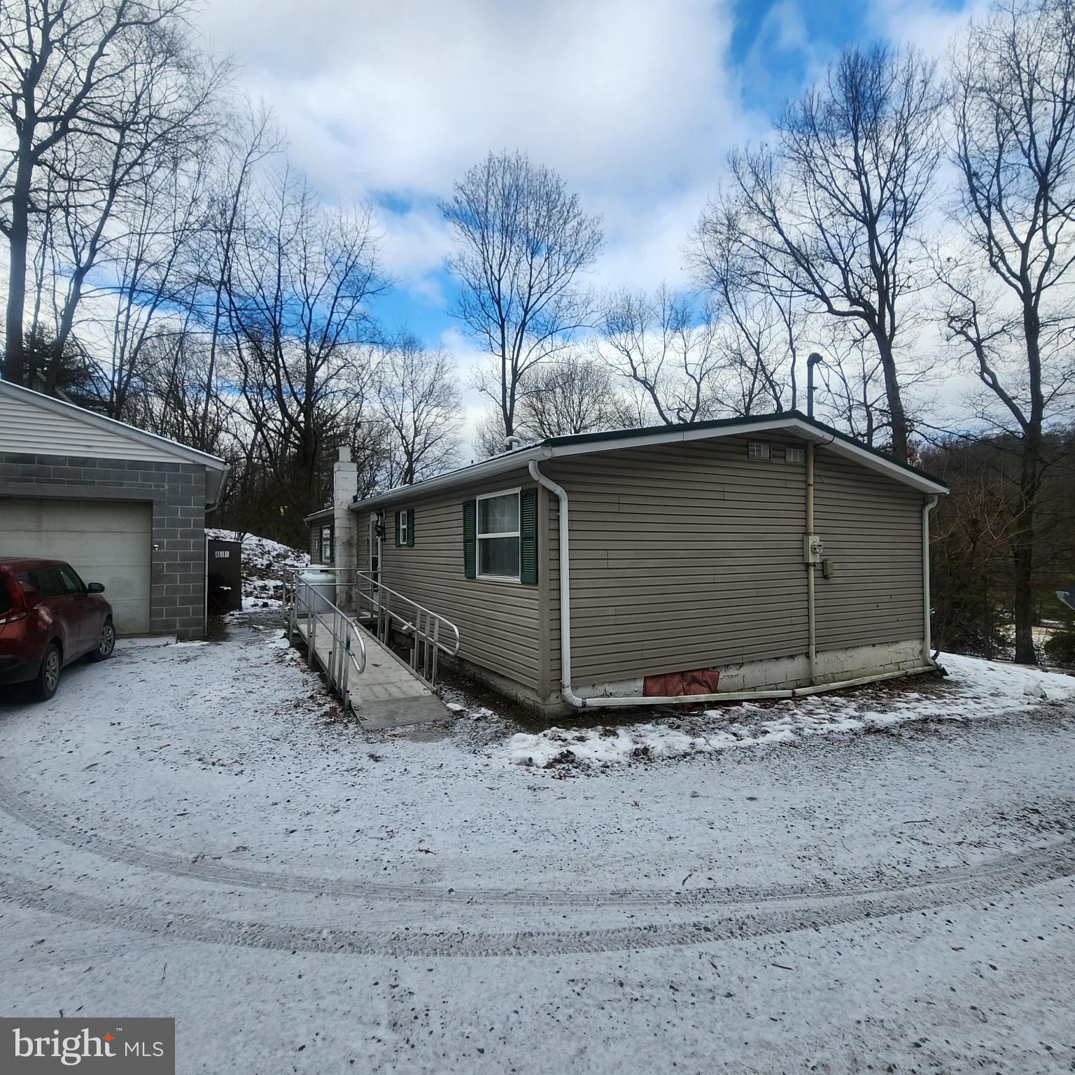 749 Clouser Hollow Road New Bloomfield, PA 17068 - Photo 27 of 30 a view of a house with a yard