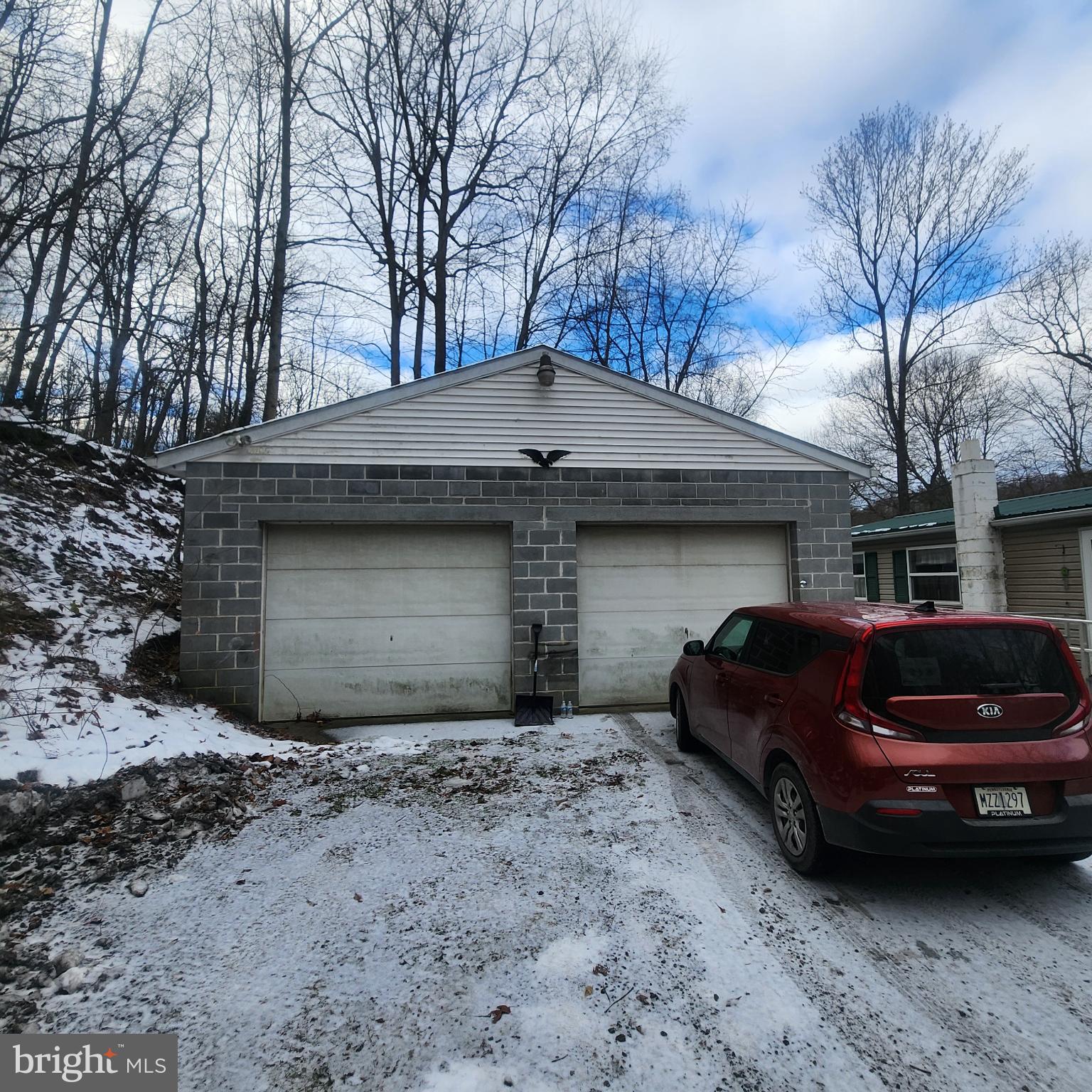 749 Clouser Hollow Road New Bloomfield, PA 17068 - Photo 30 of 30 a front view of a house with parking space