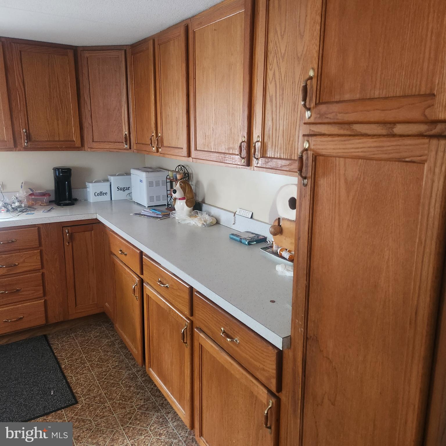 749 Clouser Hollow Road New Bloomfield, PA 17068 - Photo 4 of 30 a kitchen with stainless steel appliances white cabinets and a sink