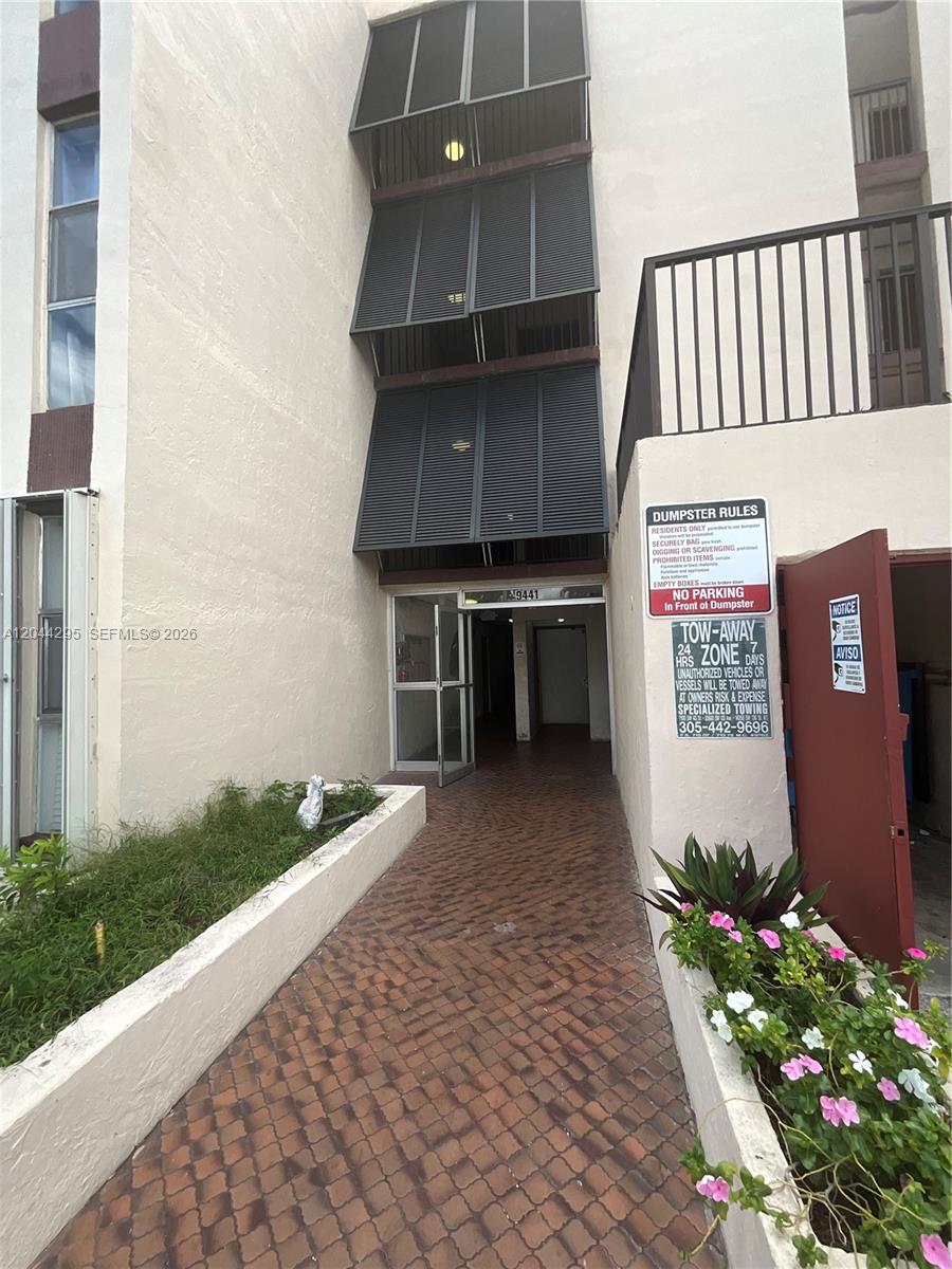 9441 Southwest 4th Street, Unit 214 Miami, FL 33174 - Photo 20 of 22 a view of a house with a yard