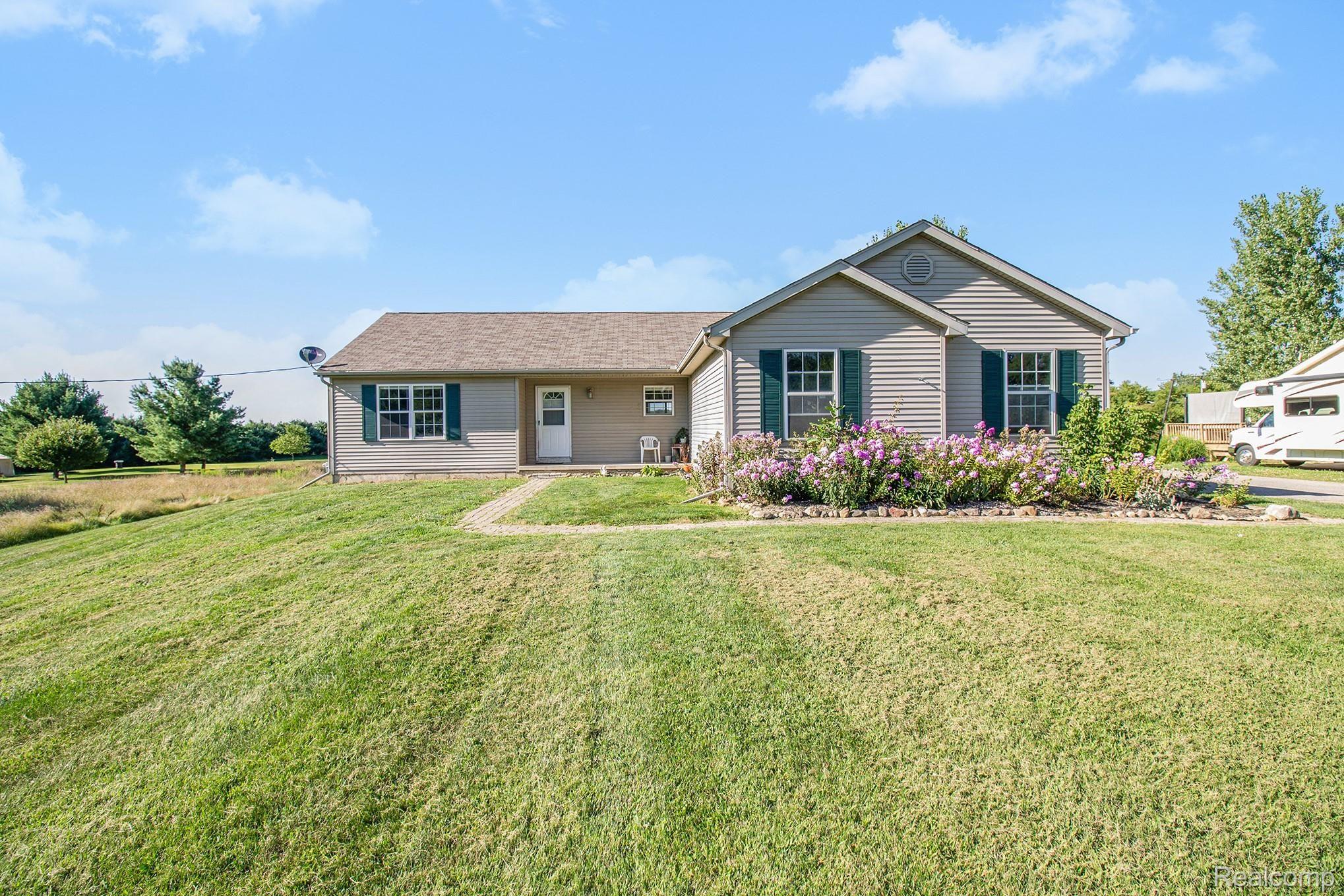 5040 West Coon Lake Road Howell, MI 48843 - Photo 25 of 27 Front of Home