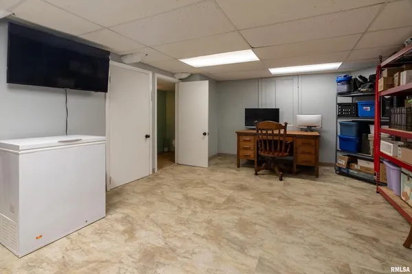 a bathroom with a sink a mirror and vanity
