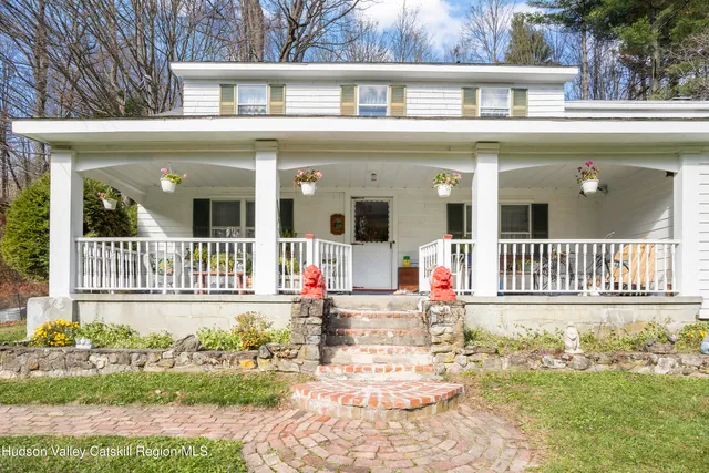front view of a house with a small yard