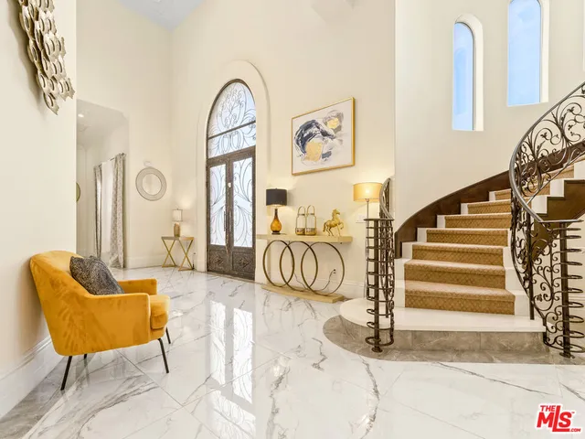 a living room with furniture and a couch