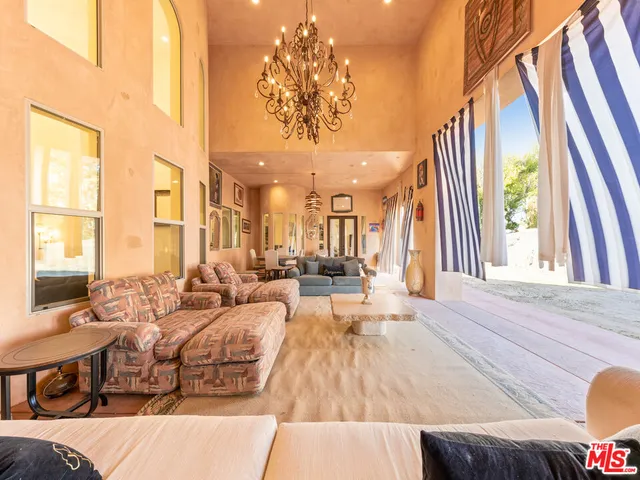 a view of a pathway along the house