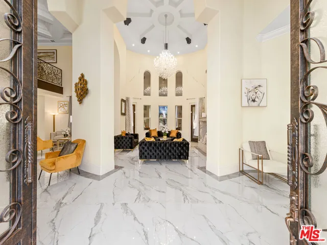 a bedroom with bed and fireplace