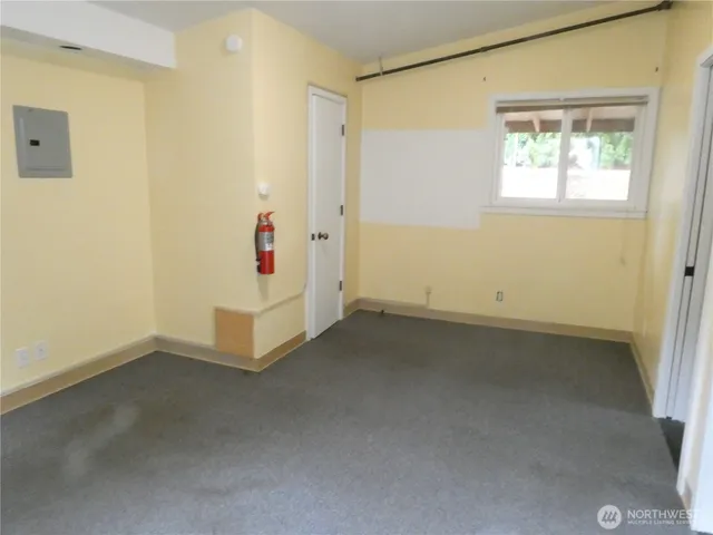 an empty room with windows