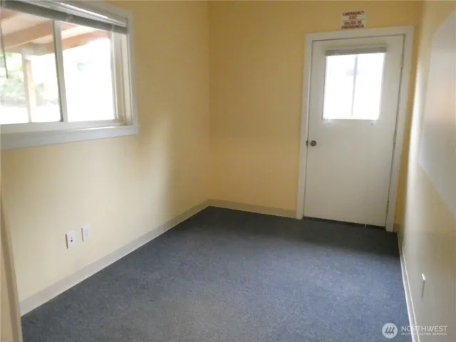 a view of a bathtub in a bathroom
