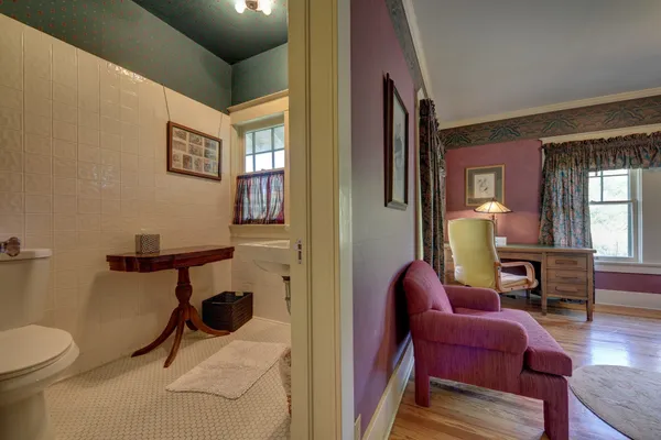 a view of a livingroom with furniture and windows