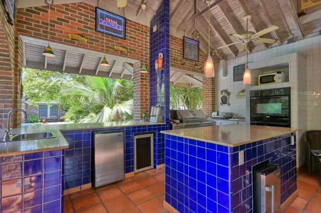 a view of a chairs and table in the patio
