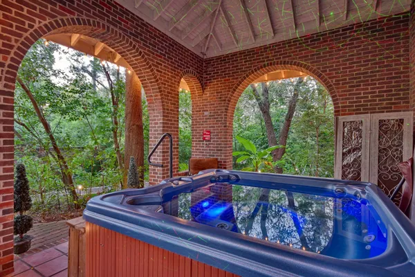 a view of swimming pool from a balcony