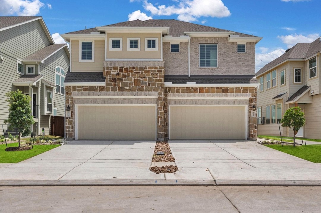 5234 Capricorn Way Manvel, TX 77578 - Photo 2 of 25 a white building with a outdoor space