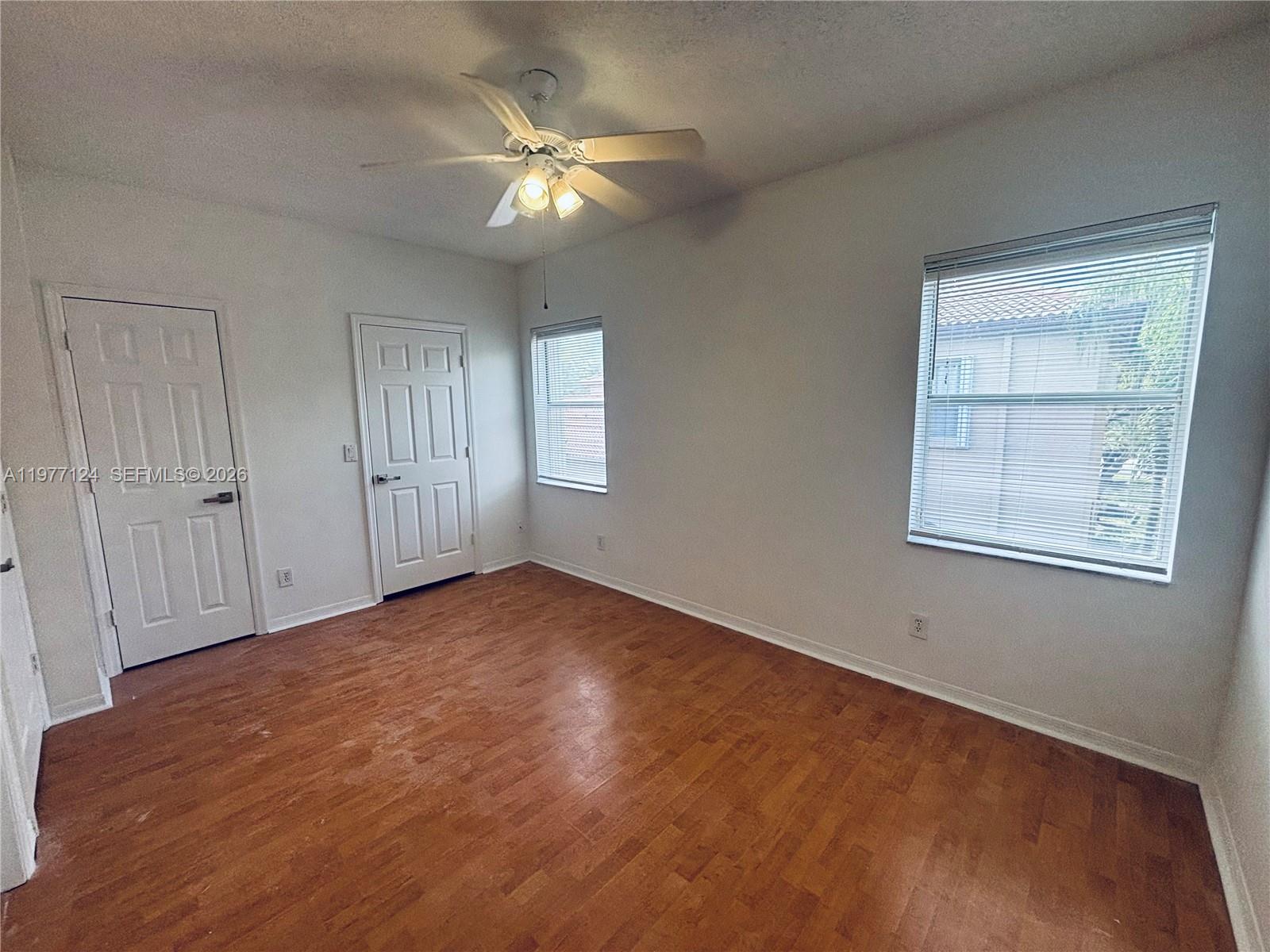 16134 Emerald Cove Road, Unit 16134 Weston, FL 33331 - Photo 11 of 20 Second Bedroom with walk in closet and linen closet