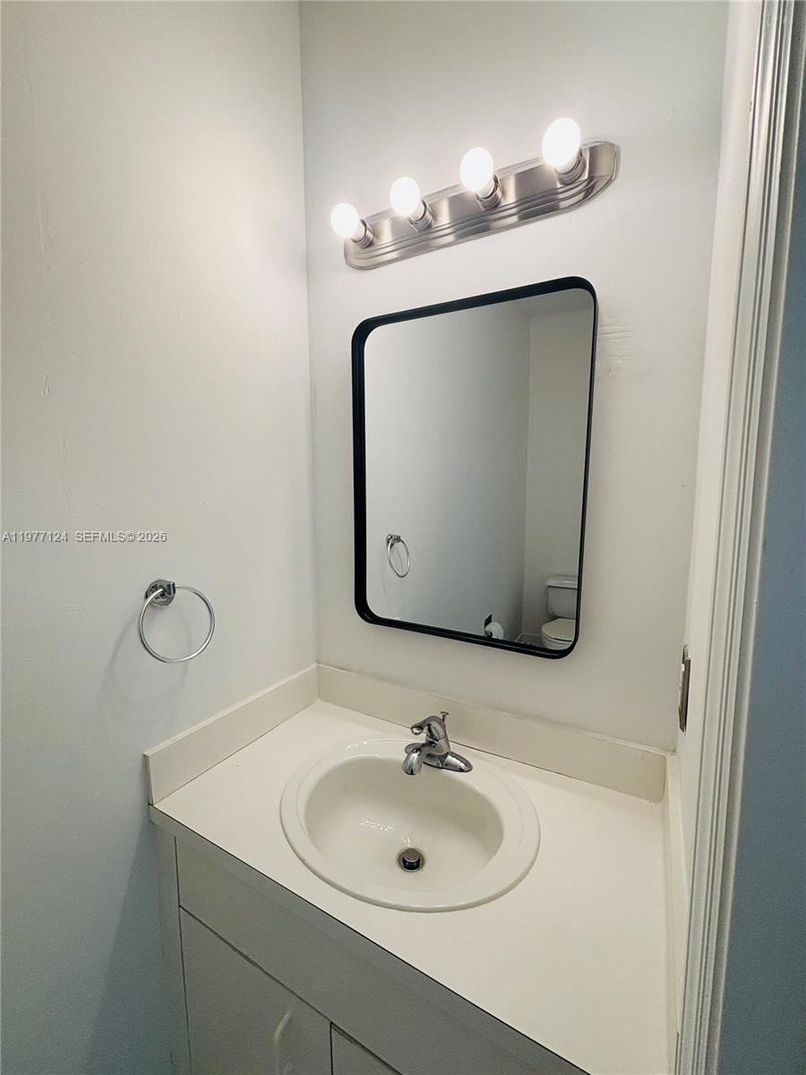 16134 Emerald Cove Road, Unit 16134 Weston, FL 33331 - Photo 8 of 20 First Floor Half Bathroom