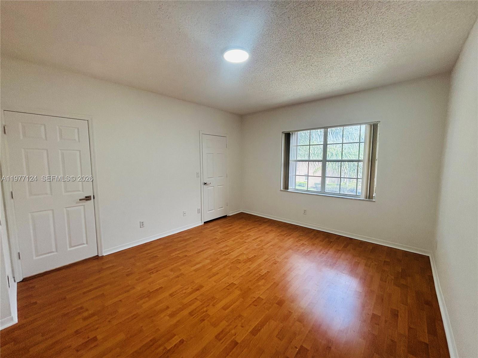 16134 Emerald Cove Road, Unit 16134 Weston, FL 33331 - Photo 9 of 20 Master Bedroom