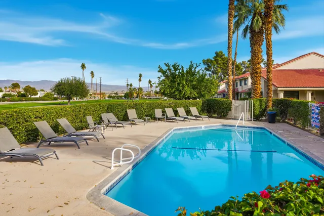 a view of a house with a swimming pool