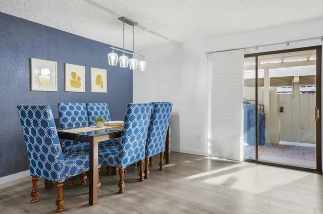 a view of a dining room with furniture