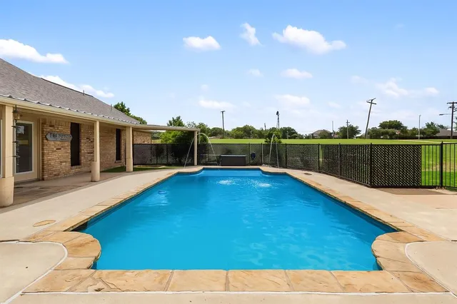 a view of a terrace with sitting area
