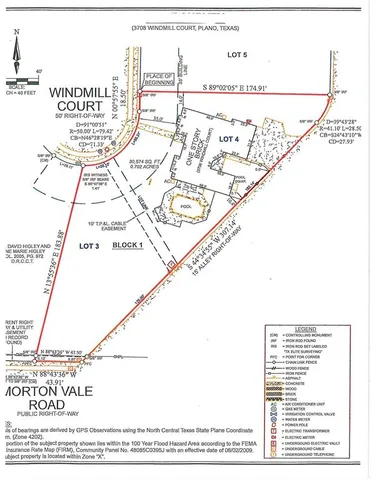 a view of a city with mountains in the background