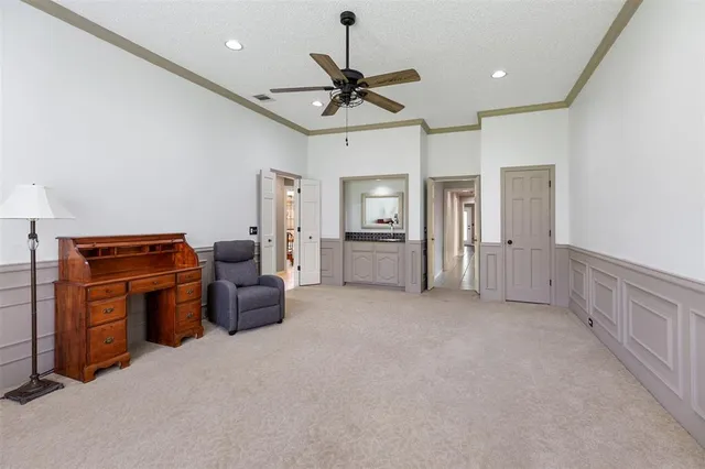 a view of a livingroom with furniture and windows