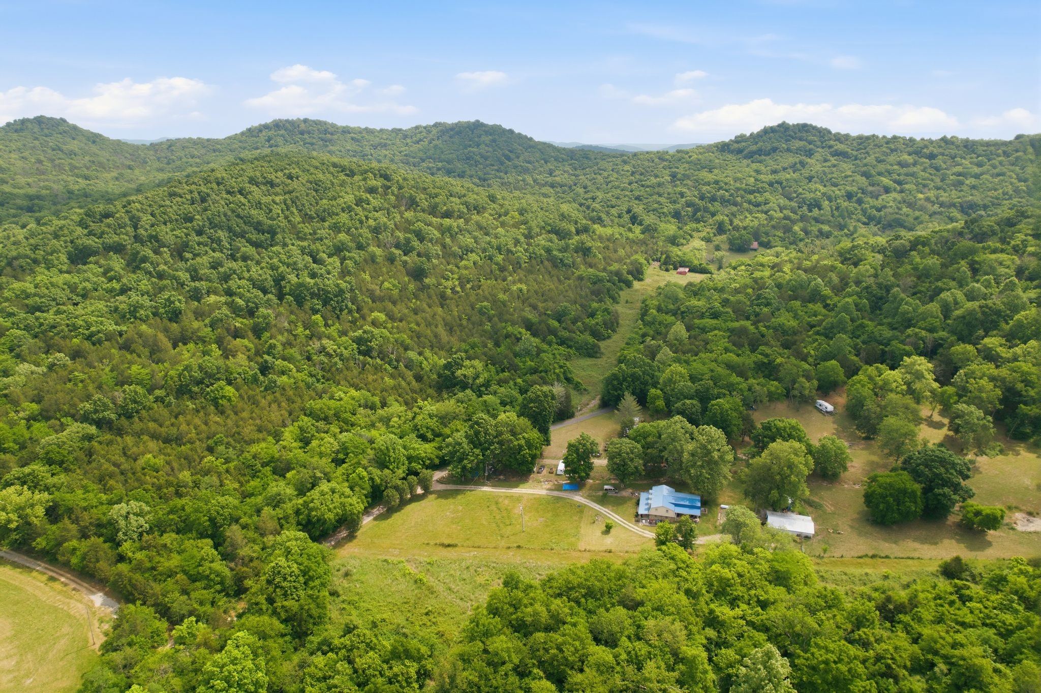 1780 Chumley Hollow Road Watertown, TN 37184 - Photo 4 of 14 a view of a lake with mountains in the background