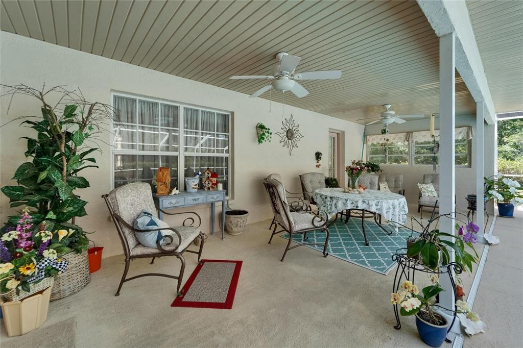 11120 Lu Wista Road Brooksville, FL 34601 - Photo 30 of 50 a living room filled with furniture