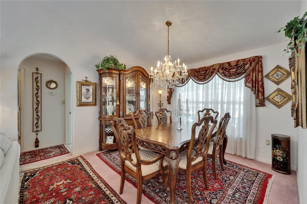 11120 Lu Wista Road Brooksville, FL 34601 - Photo 9 of 50 a view of a dining room with furniture