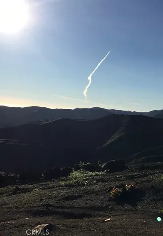a view of outdoor space and mountain