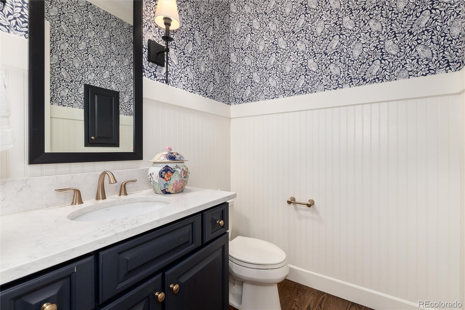 7175 Polo Ridge Drive Littleton, CO 80128 - Photo 19 of 50 a bathroom with a sink and a toilet