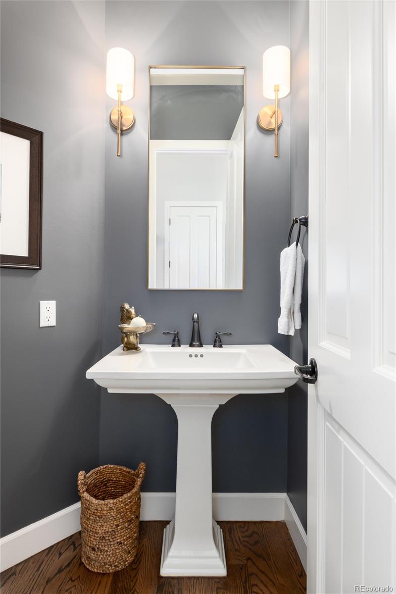 7175 Polo Ridge Drive Littleton, CO 80128 - Photo 21 of 50 a bathroom with a sink and a mirror