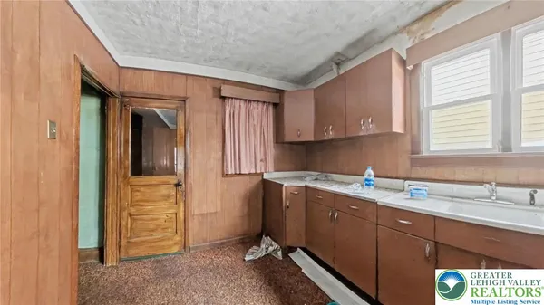 a bathroom with a sink and a shower