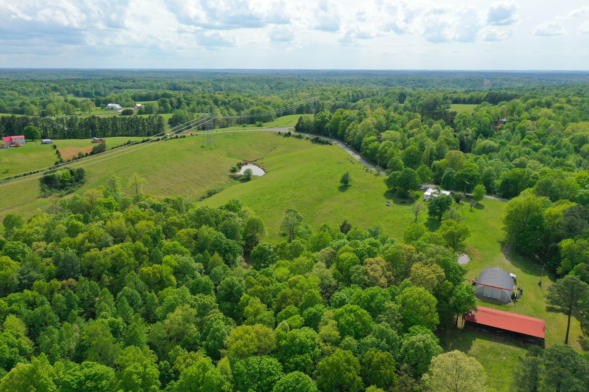 3915 Oak Ridge Road Palmyra, TN 37142 - Photo 29 of 61 an aerial view of a houses with a yard