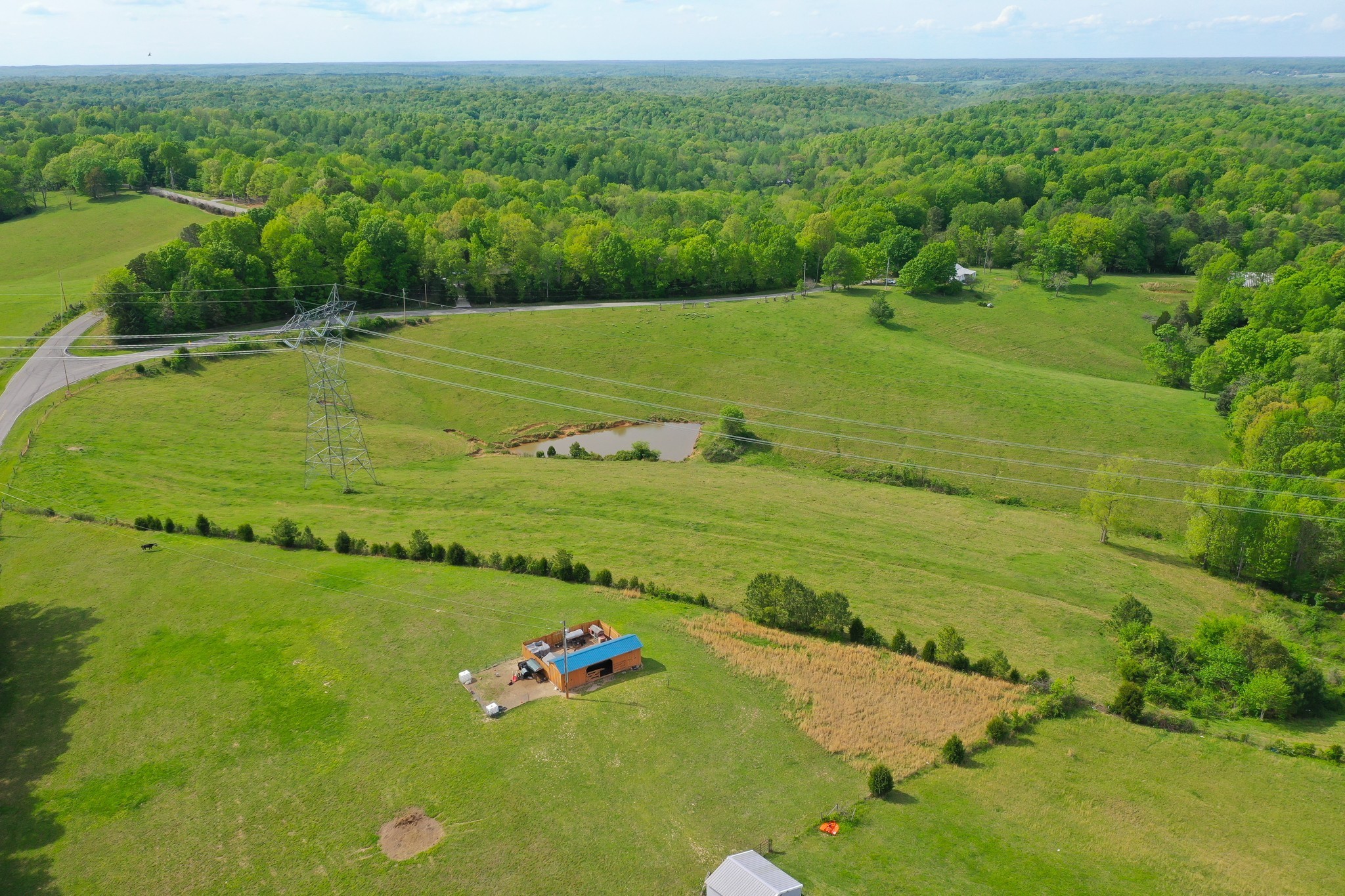 3915 Oak Ridge Road Palmyra, TN 37142 - Photo 33 of 61 a view of a golf course with a field