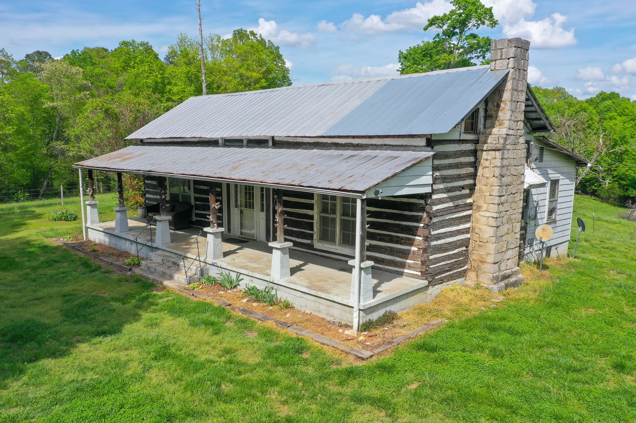 3915 Oak Ridge Road Palmyra, TN 37142 - Photo 43 of 61 a view of a house with a backyard and a patio