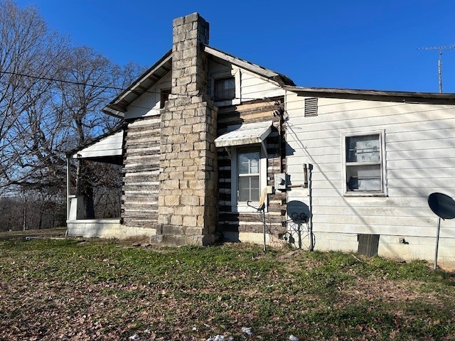 3915 Oak Ridge Road Palmyra, TN 37142 - Photo 46 of 61 a view of a house with a yard