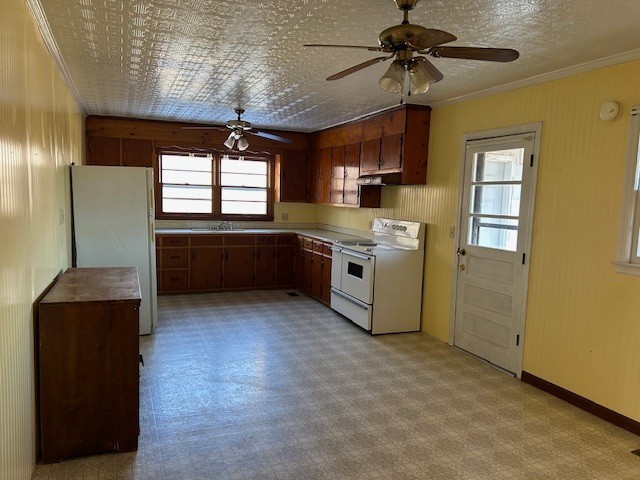 3915 Oak Ridge Road Palmyra, TN 37142 - Photo 50 of 61 a kitchen with stainless steel appliances granite countertop a refrigerator a sink dishwasher a stove and a dining table with wooden floor