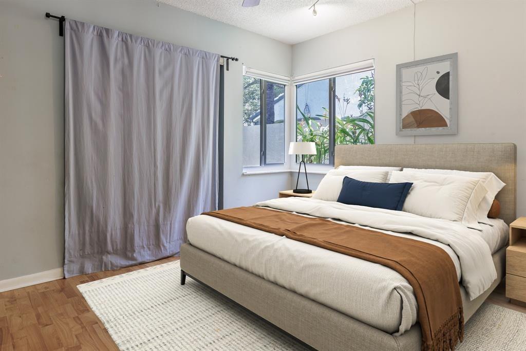 2945 Begonia Way Cooper City, FL 33026 - Photo 7 of 26 a bedroom with a bed and a window