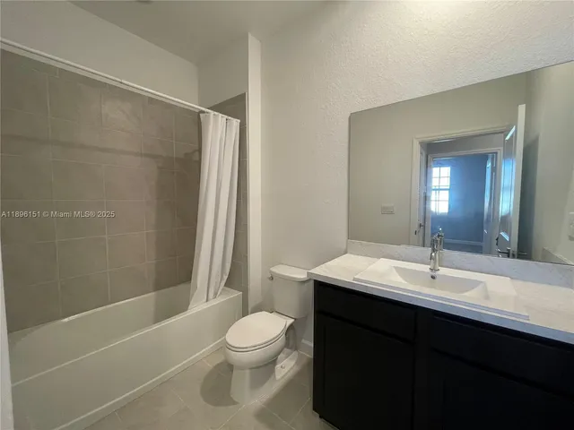 a front view of a house with yard