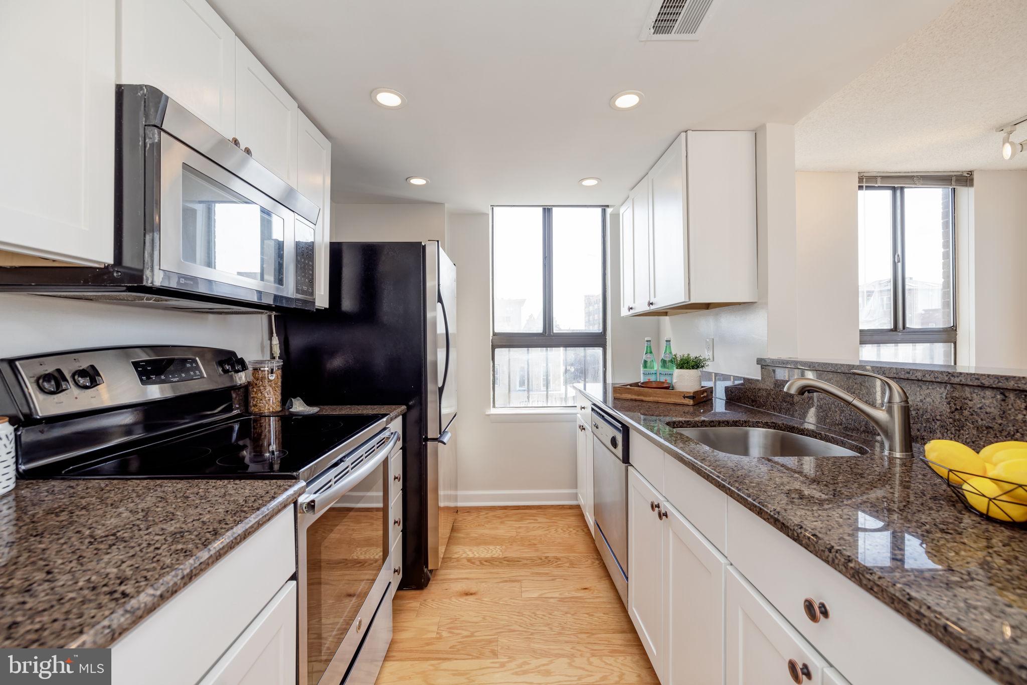 1700 17th Street Northwest, Unit 505 Washington, DC 20009 - Photo 7 of 26 Stylish galley-style kitchen