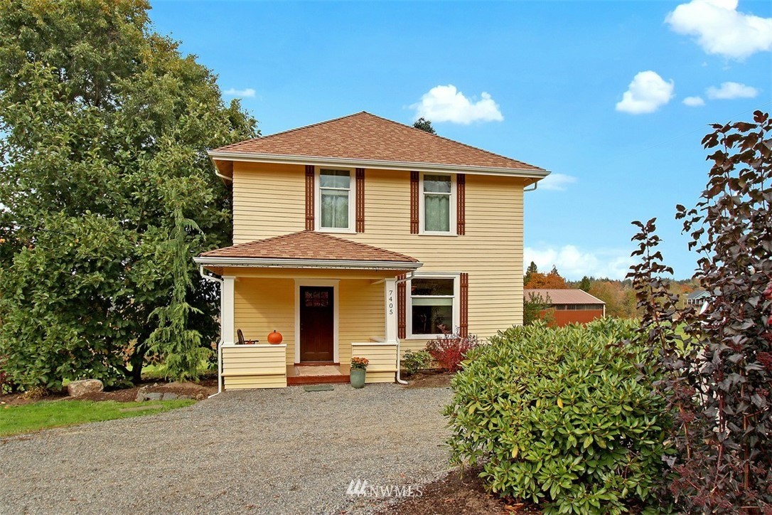 7405 Skipley Road Snohomish, WA 98290 - Photo 1 of 25 a front view of a house with a yard