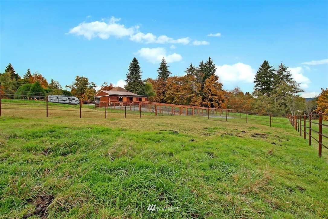 7405 Skipley Road Snohomish, WA 98290 - Photo 24 of 25 a view of a big yard with swimming pool and large trees