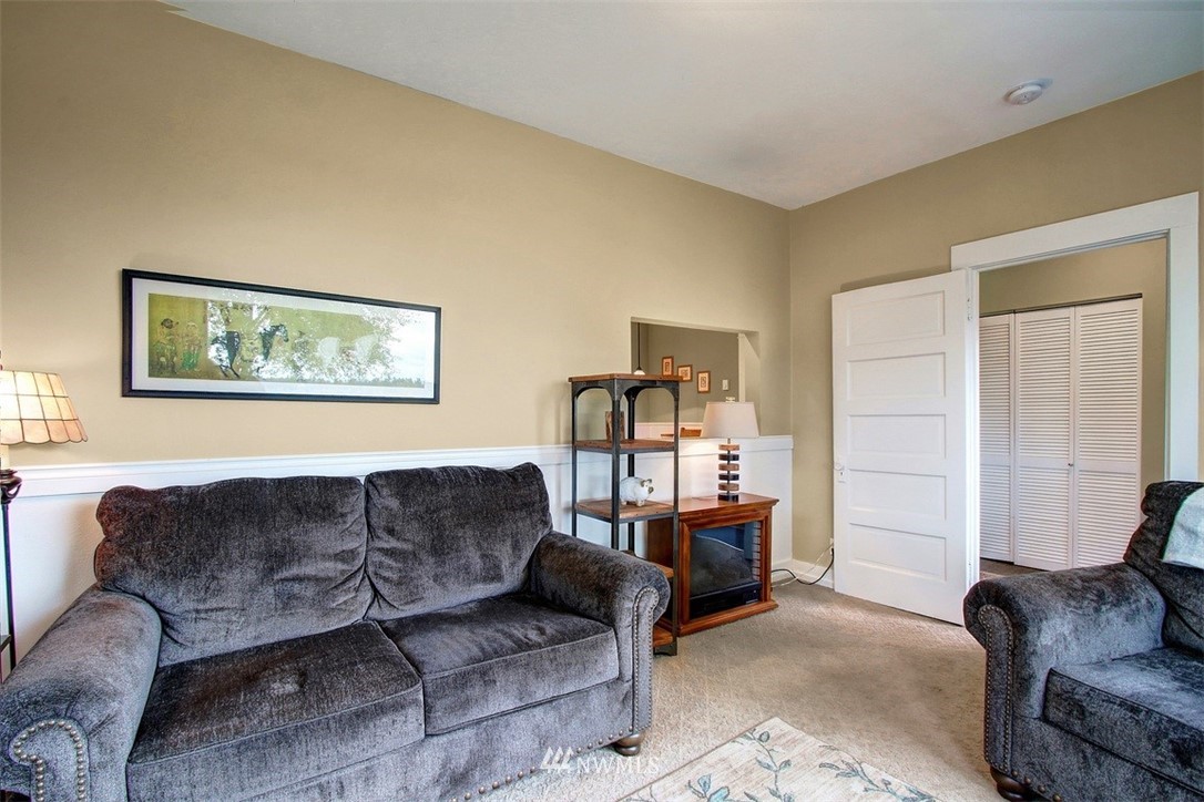 7405 Skipley Road Snohomish, WA 98290 - Photo 8 of 25 a living room with furniture and a window