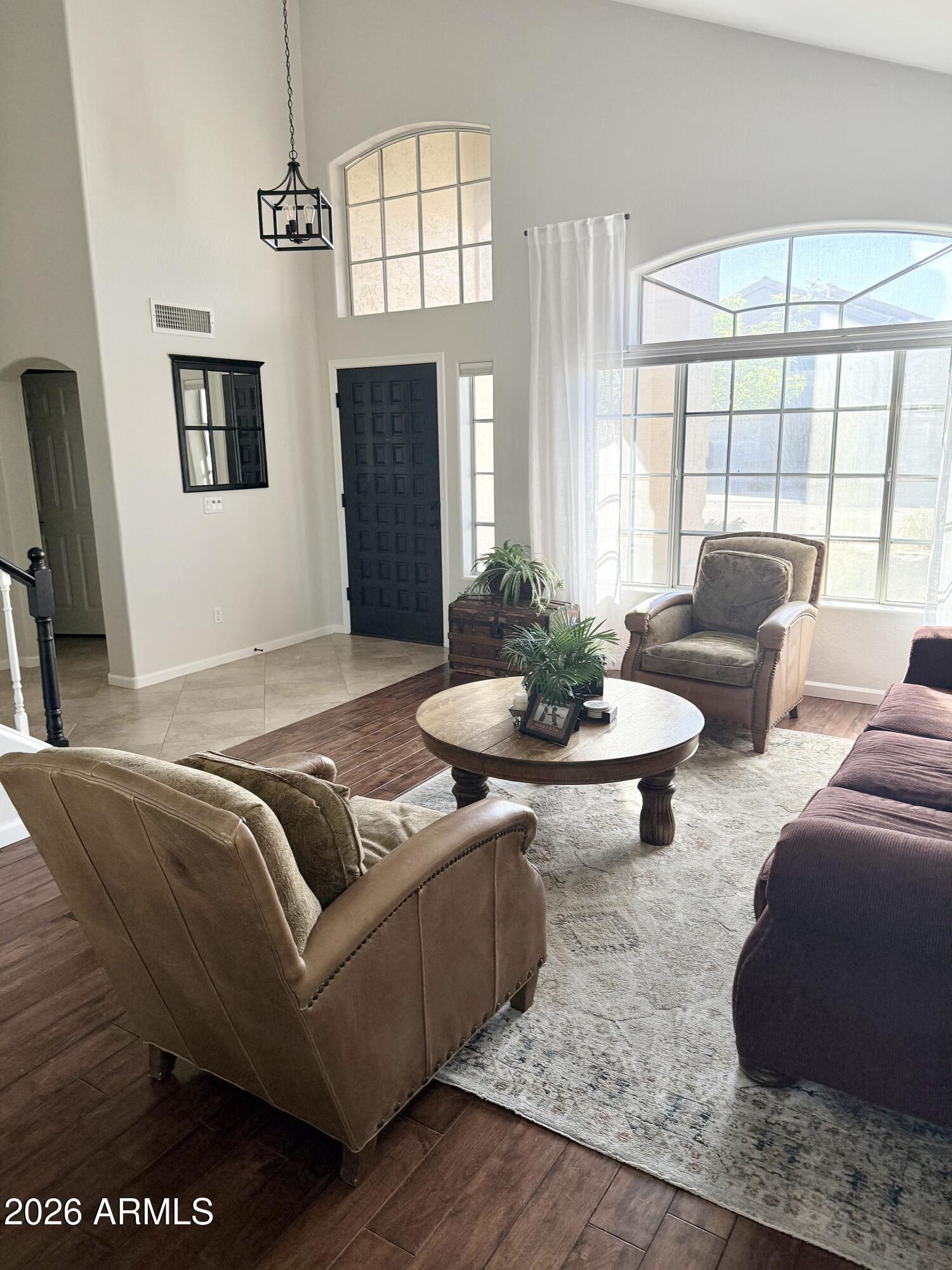 3426 East Clark Road Phoenix, AZ 85050 - Photo 20 of 48 a living room with furniture and a large window