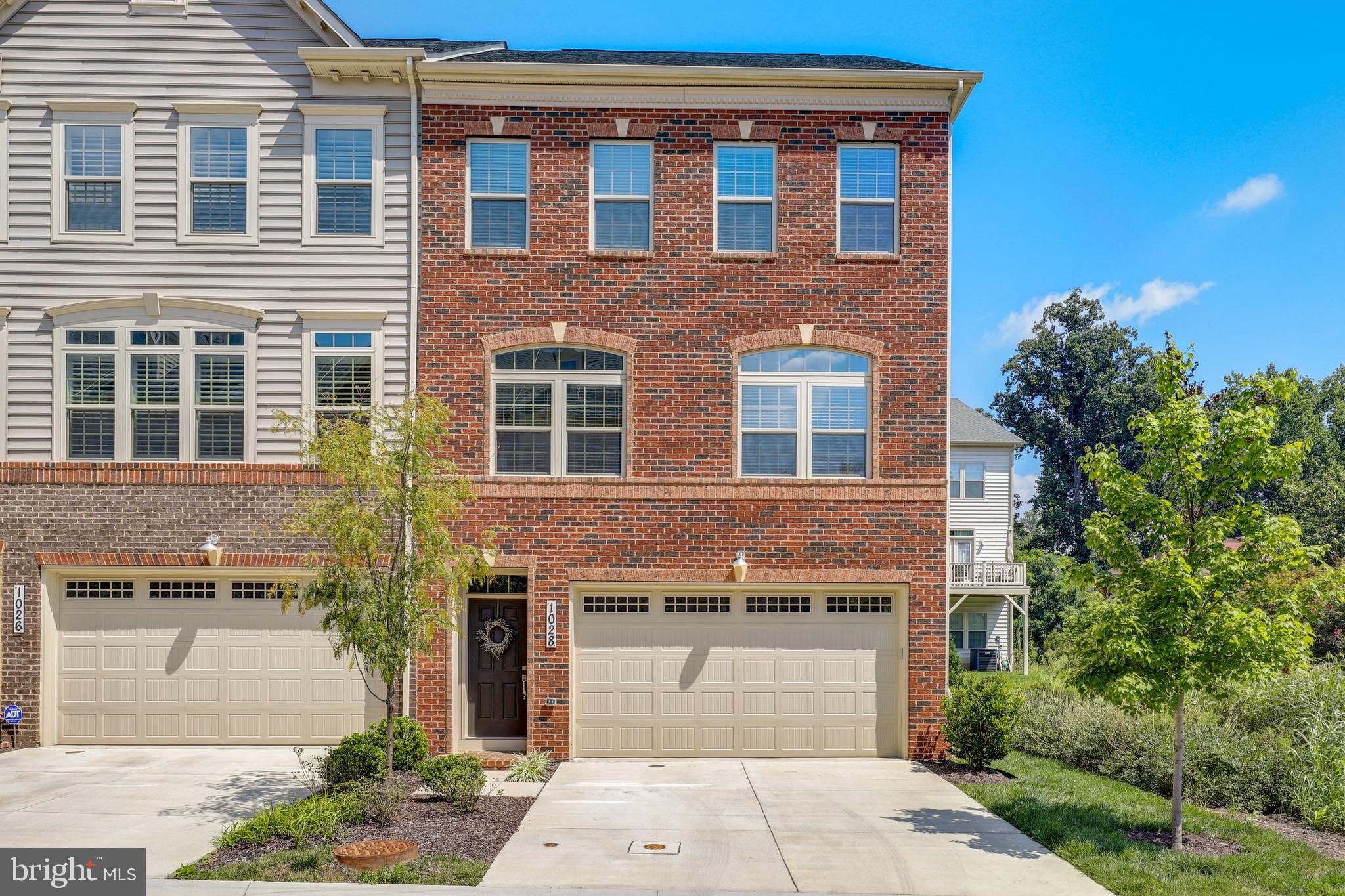 1028 Mutual Place Sandy Spring, MD 20860 - Photo 1 of 35 a front view of a house with a yard