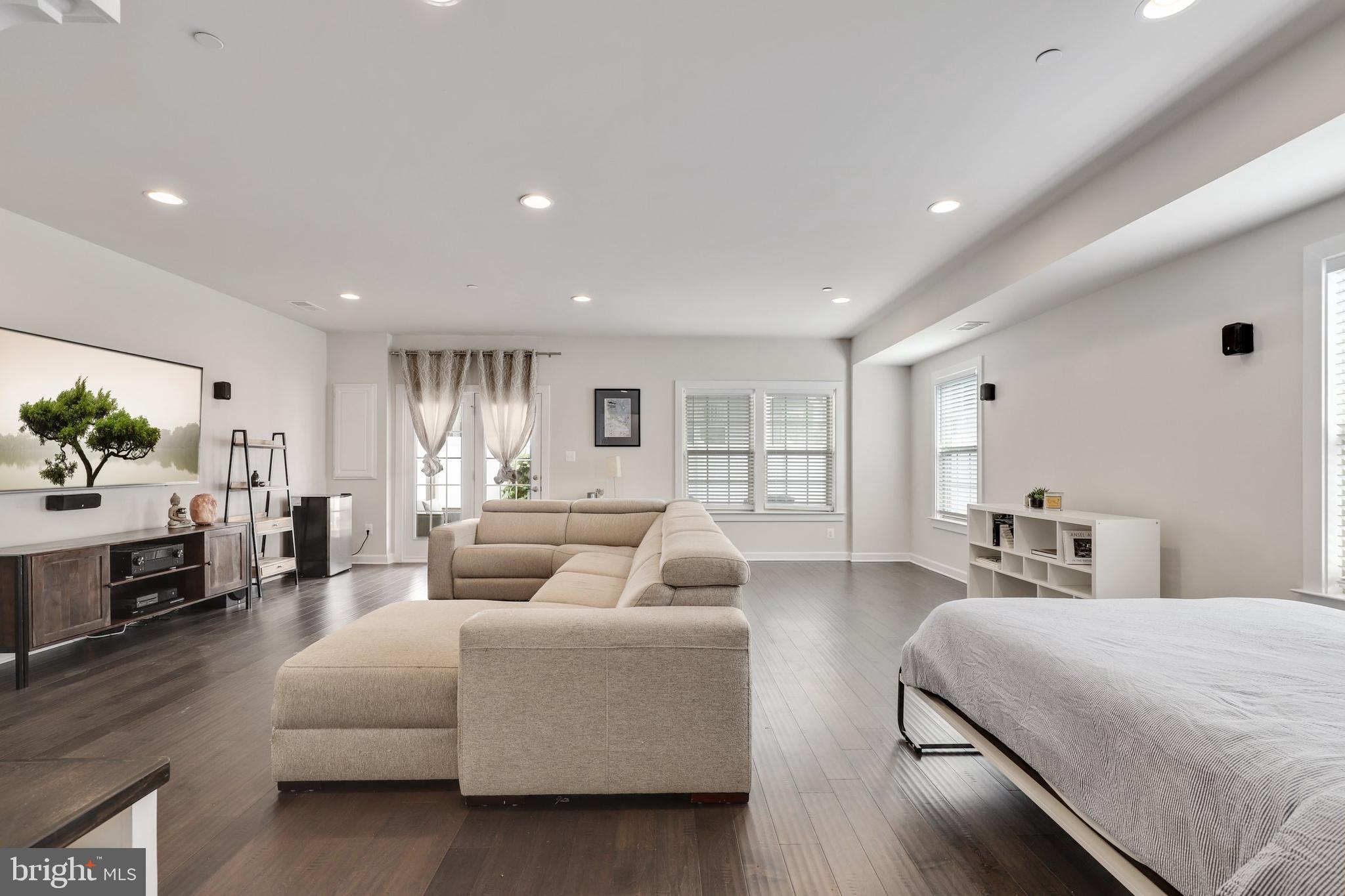 1028 Mutual Place Sandy Spring, MD 20860 - Photo 22 of 35 a living room with furniture and a flat screen tv