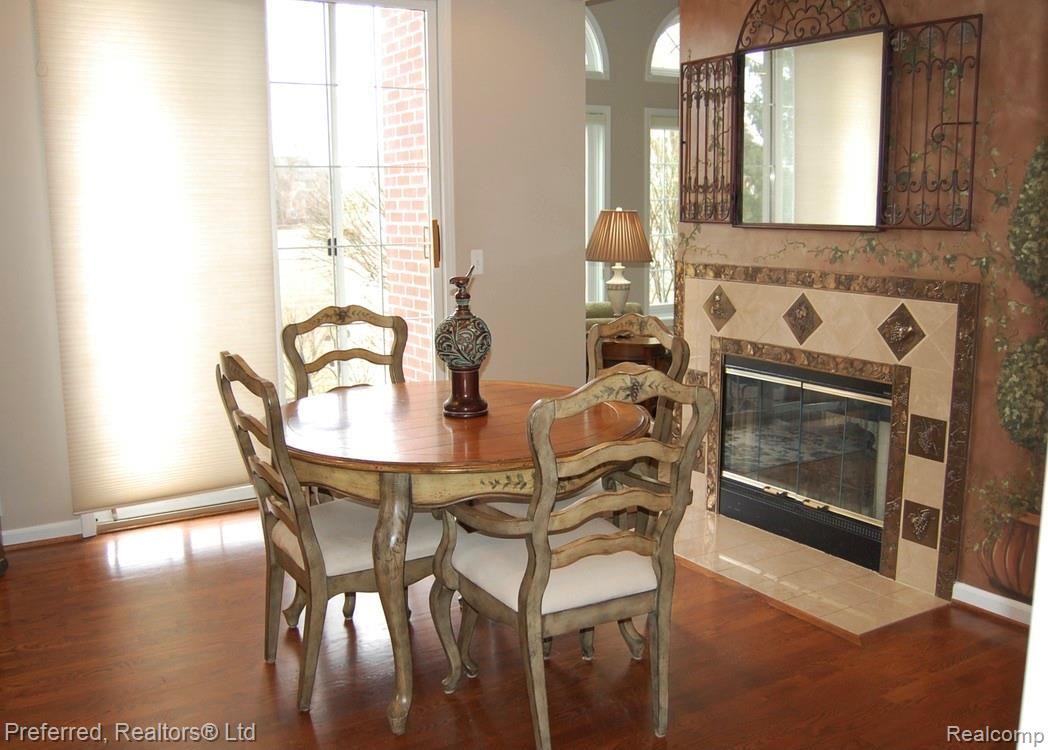47875 Pavillon Road Canton, MI 48188 - Photo 26 of 58 Breakfast Area w/Fireplace