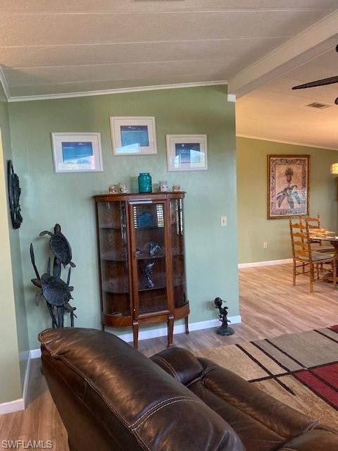 139 Rookery Road Naples, FL 34114 - Photo 13 of 37 a living room with furniture and a lamp